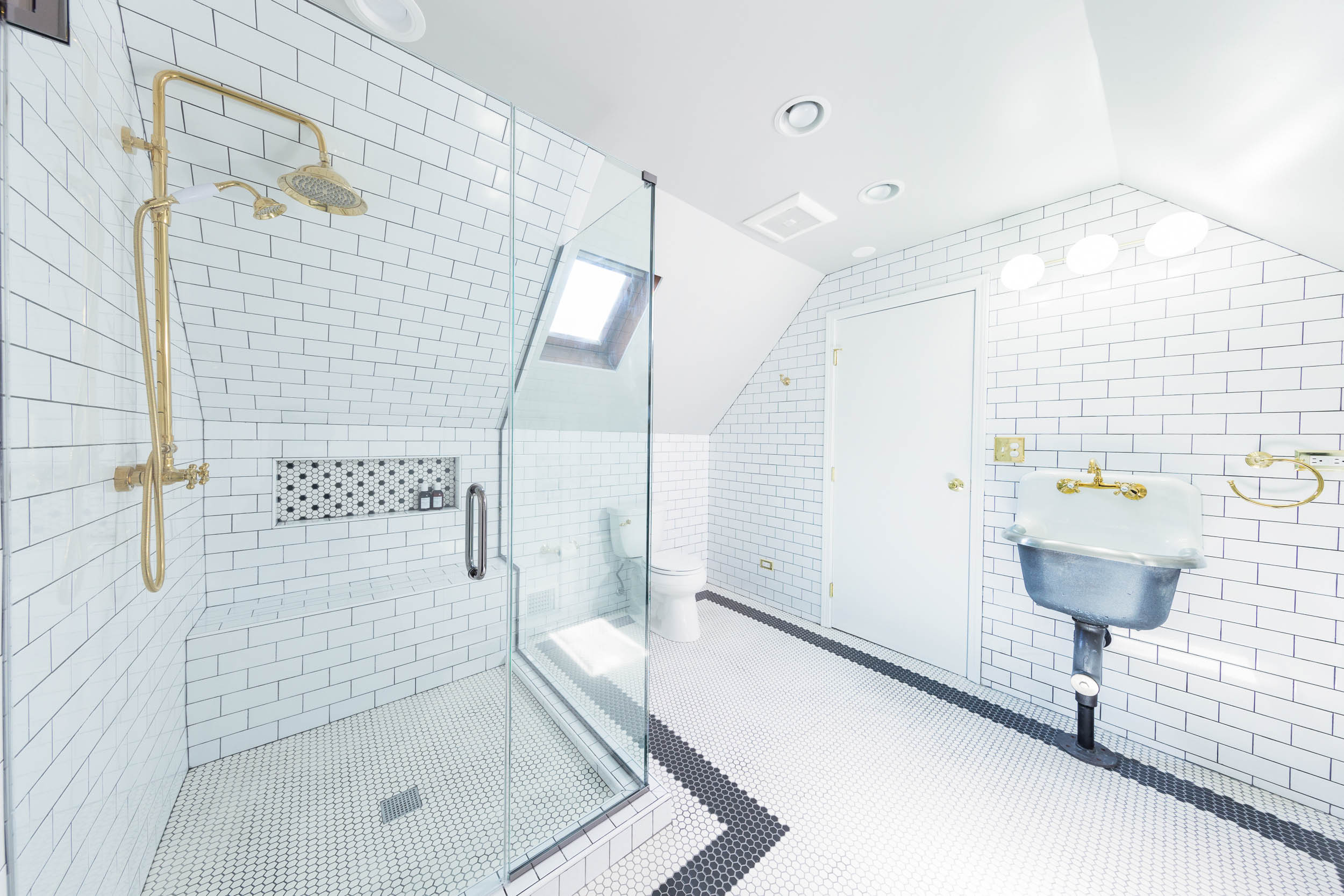 Attic bathroom remodeling project in Chicago by Coco Design Build